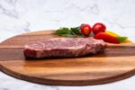 BEEF STRIP STEAK 8 OZ C/C CHOICE 1855 ANGUS