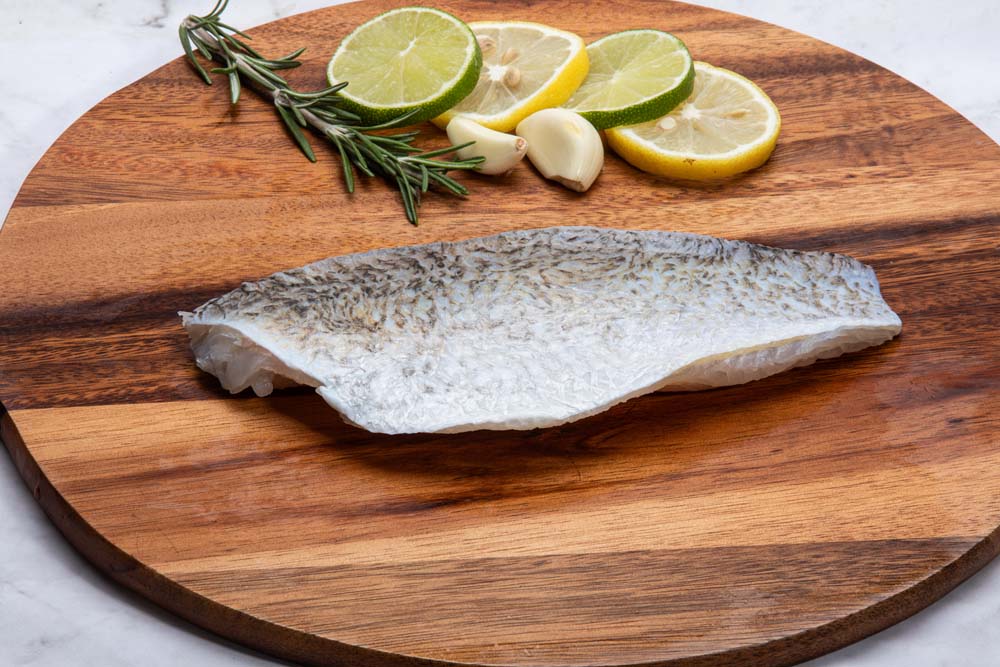 27004 BARRAMUNDI FILLET SK/ON 6-8 OZ IVP - Image 1